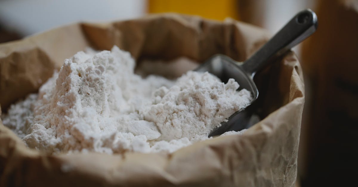 Baking a Pie in a Stainless Steel - Paper bag of wheat flour with stainless scoop