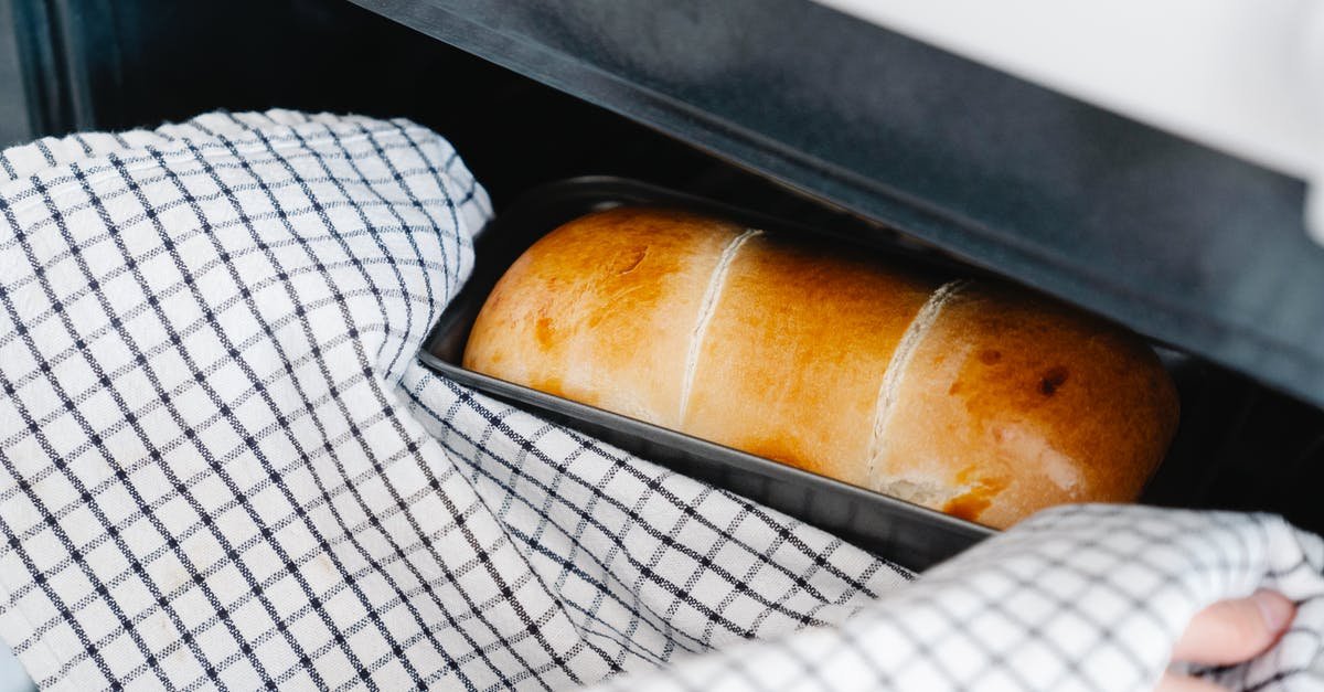 Baking Bread in a Dutch Oven - Close-Up Shot of a Person Baking a Bread