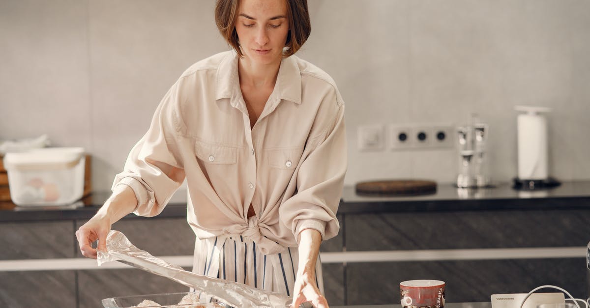 Baking chicken in oven, but keeping it moist - Woman Preparing For Dinner