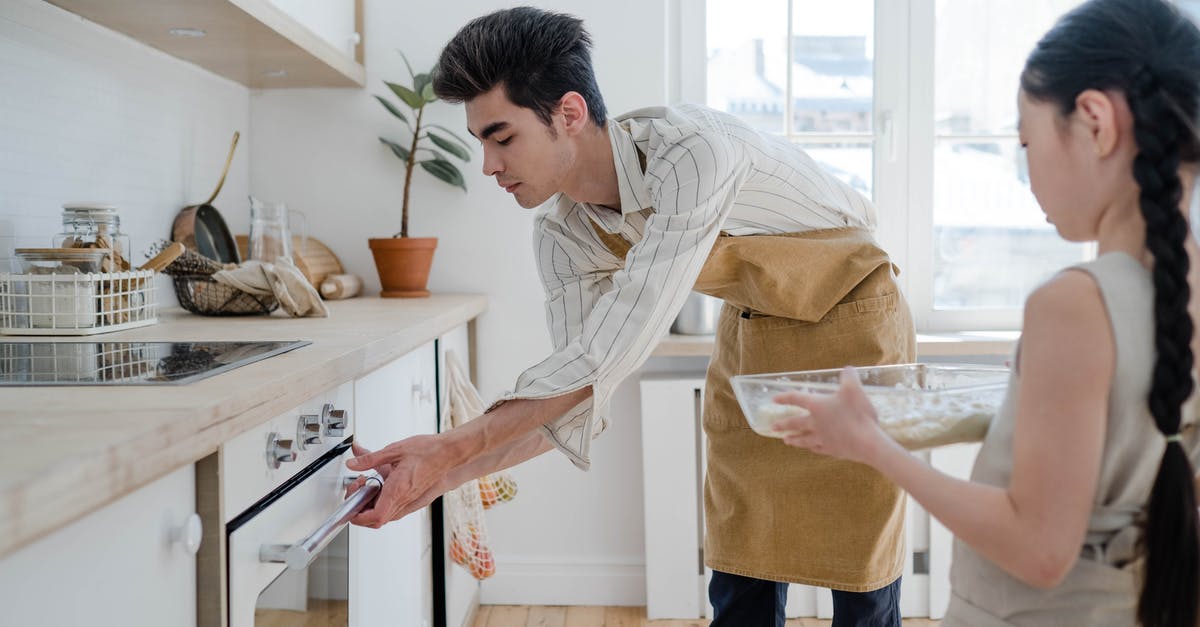 Baking Electric Fan Oven - Father and Daughter in the Kitchen