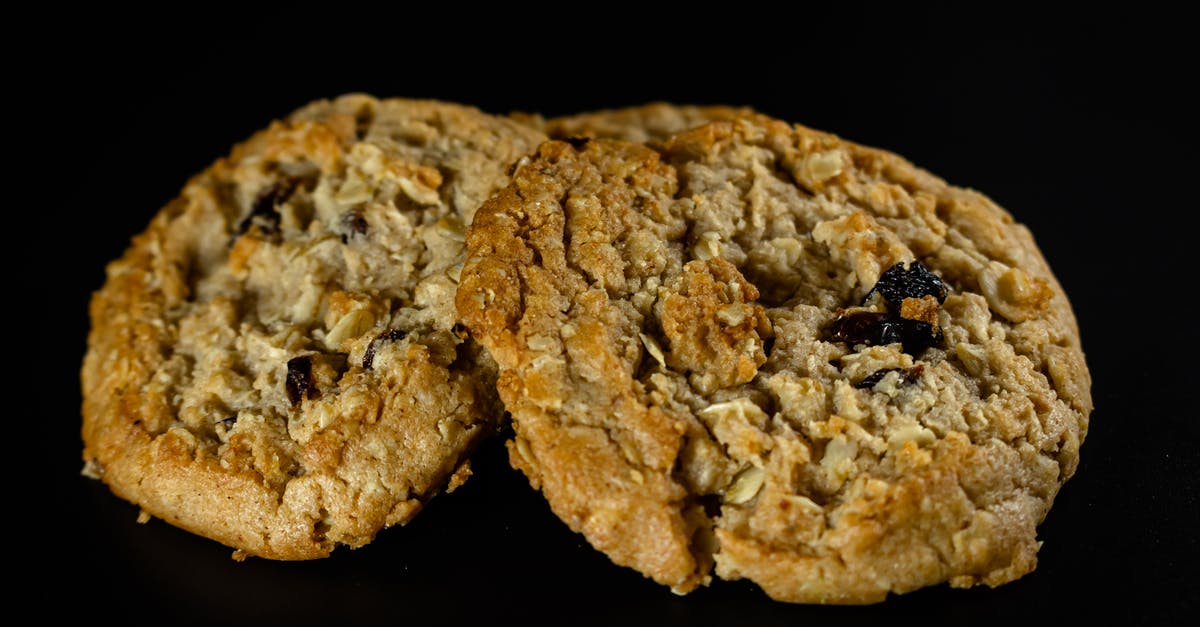 Baking great chewy oatmeal cookies with Quaker Instant Oatmeal Fruit packs - Close-Up Photo of Two Oatmeal Cookies with Raisins