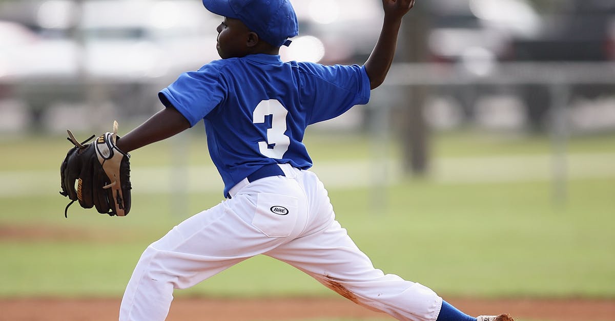 Ball Shaper for Batter - Boy Wearing Blue and White 3 Jersey About to Pitch a Baseball