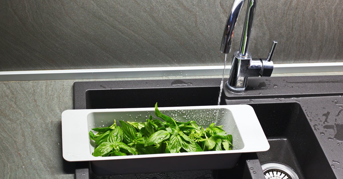 Basil - to wash or not to wash? Best practices? - Sink strainer with green basil