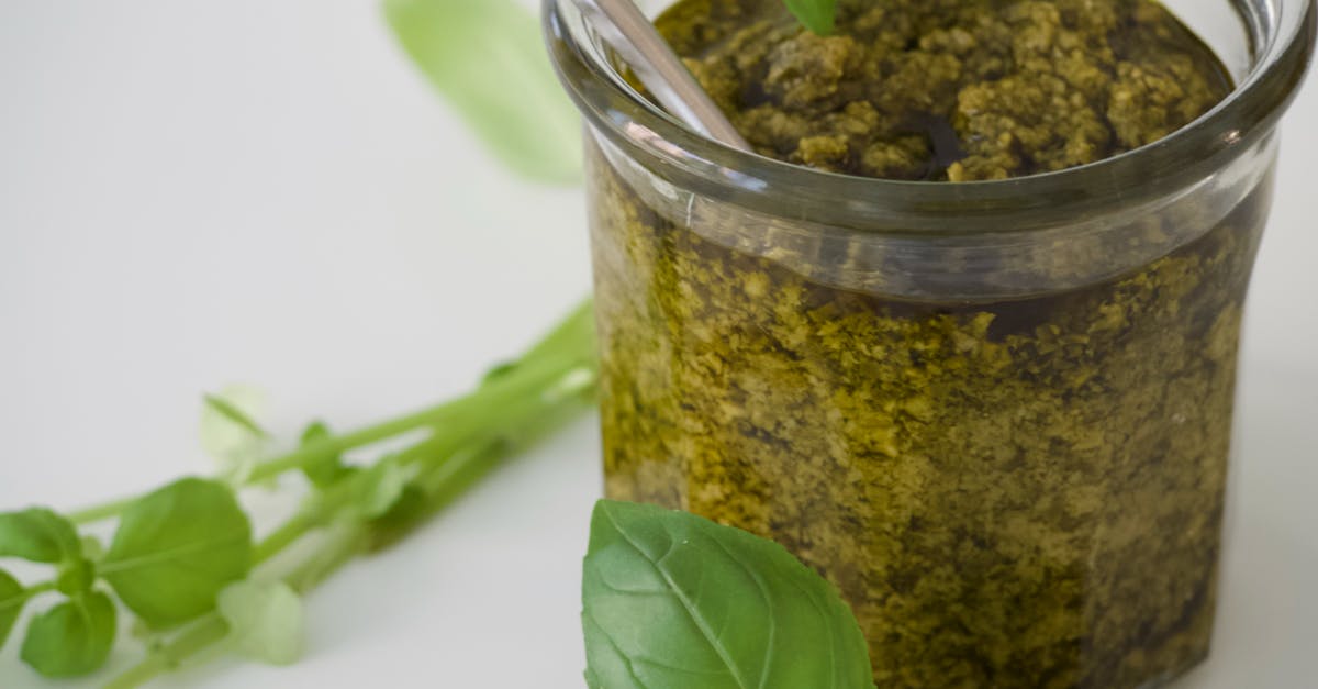 Basil Pesto Vinaigrette - what kind of vinegar? - Basil Leaves On Pesto Sauce in Clear Glass Jar