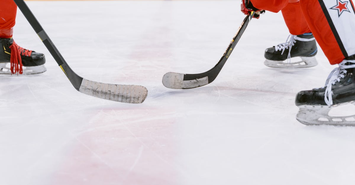 Battle Of the Gums? (effects on Ice Cream) - Ice Hockey Players on Ice Field