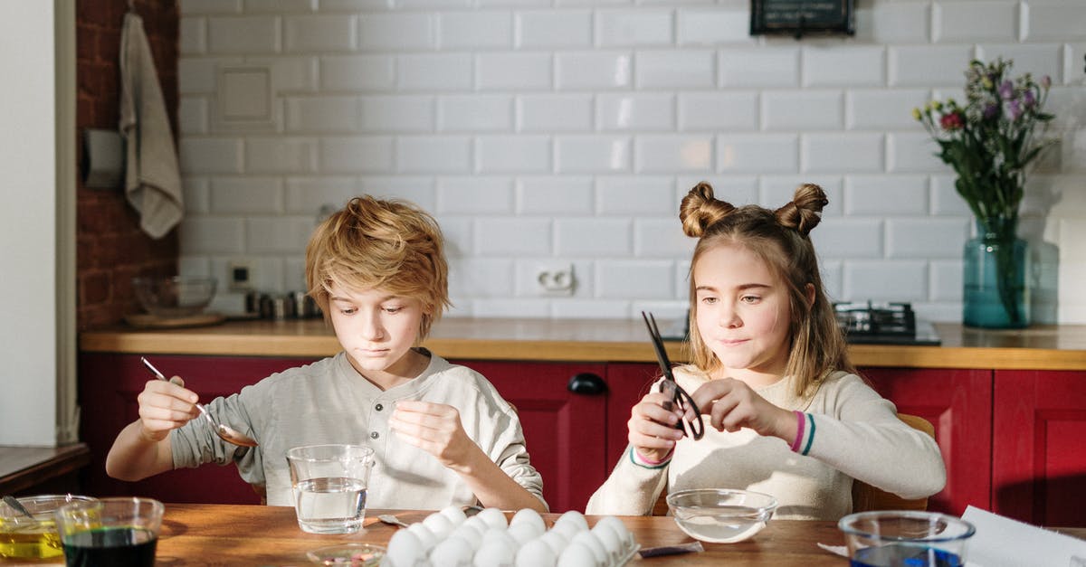 Beating eggs & sugar when making gelato - Siblings Doing DIY Easter Eggs