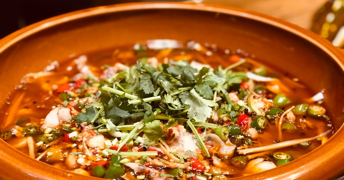 Beef Barley Soup with too much wine - Green Basil Topped Dish in Brown Bowl