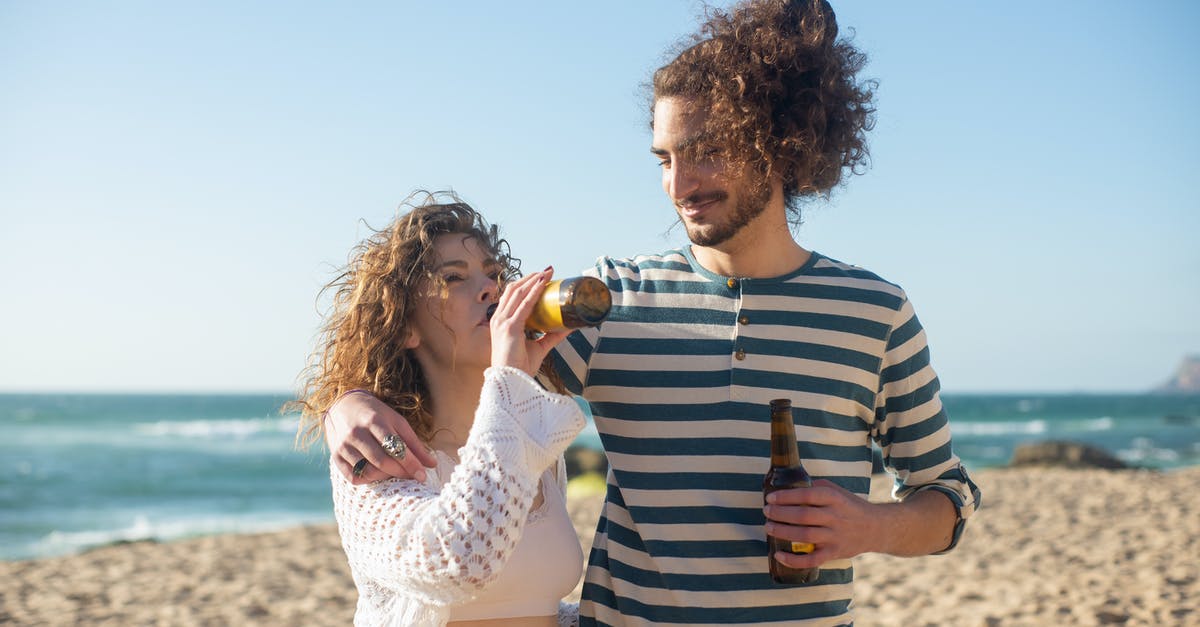 Beer Battered Onion Rings -- what makes them look shiny? - Couple Drinking Beer on Beach