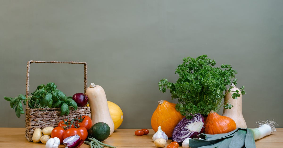 Best potato varieties to use for mashing - Assorted Fresh Vegetables and a Woven Basket on a Wooden Table