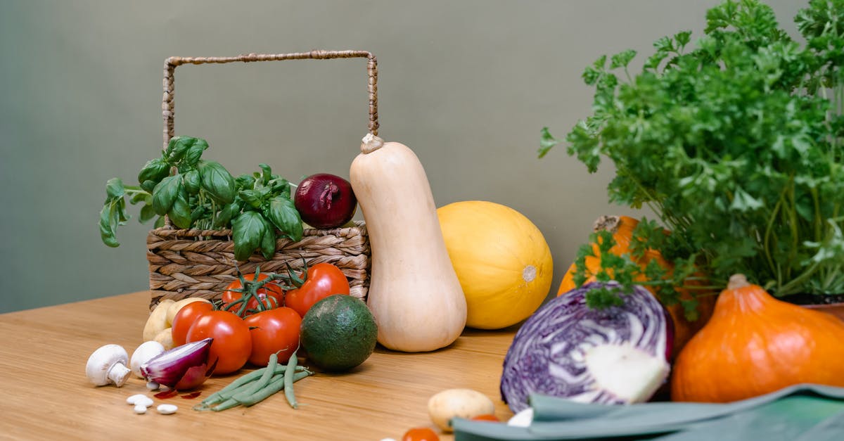 Best potato varieties to use for mashing - Assorted Vegetables in a Basket and on a Wooden Table