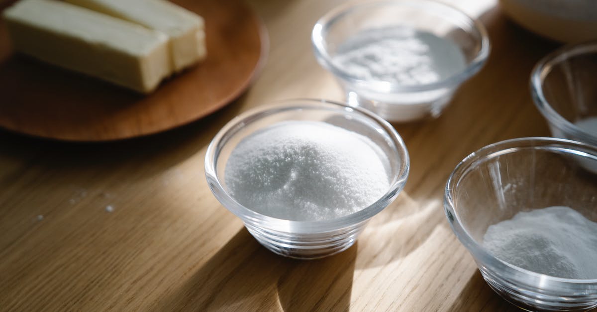 Best Practice at cutting butter and sugar in Peanut Butter balls - Close-Up Shot of Baking Ingredients on Wooden Surface