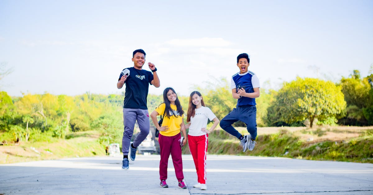 Best way to cheat at hollandaise? - Happy Asian friends having fun together in park