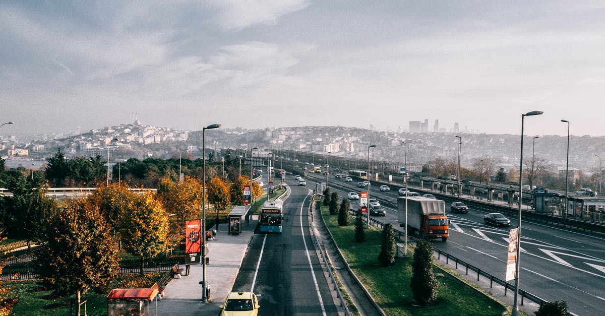 Best way to prepare multiple pans of lasagna - Multiple lane highway with driving vehicles located in Istanbul city suburb area on autumn day