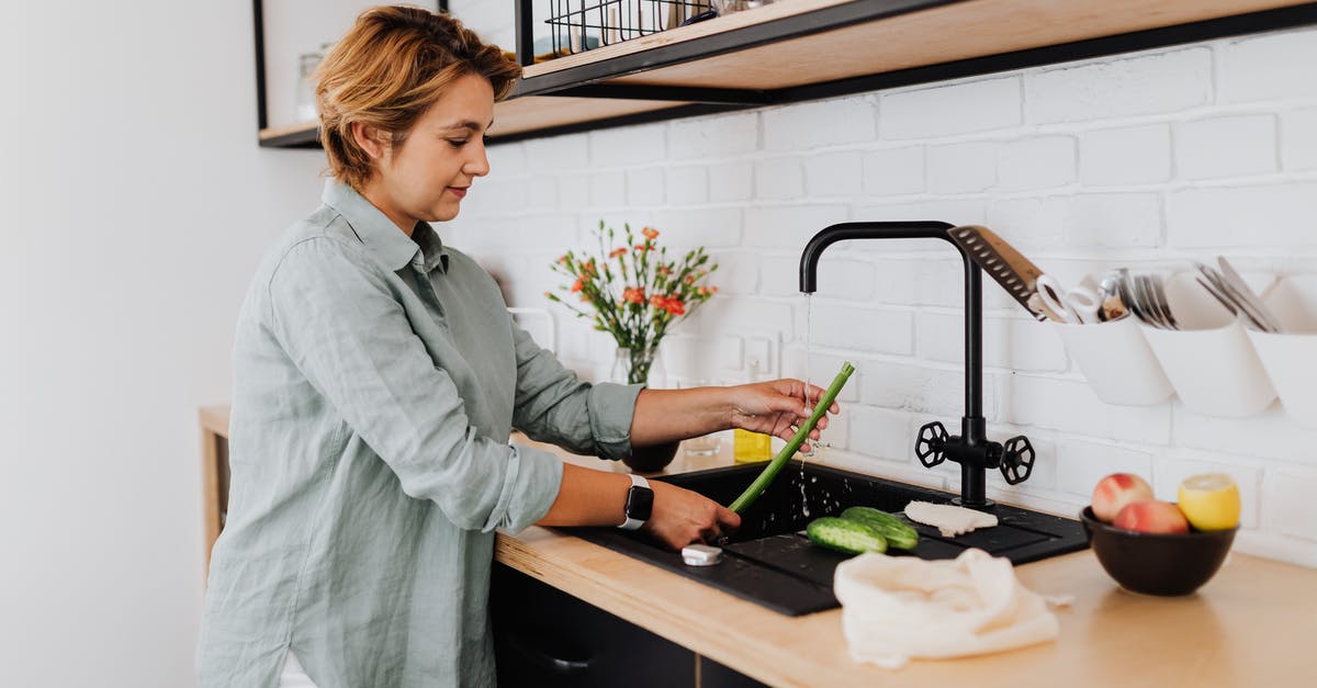 Best way to preserve nutrients while dehydrating fruit and veggies - Woman in Kitchen