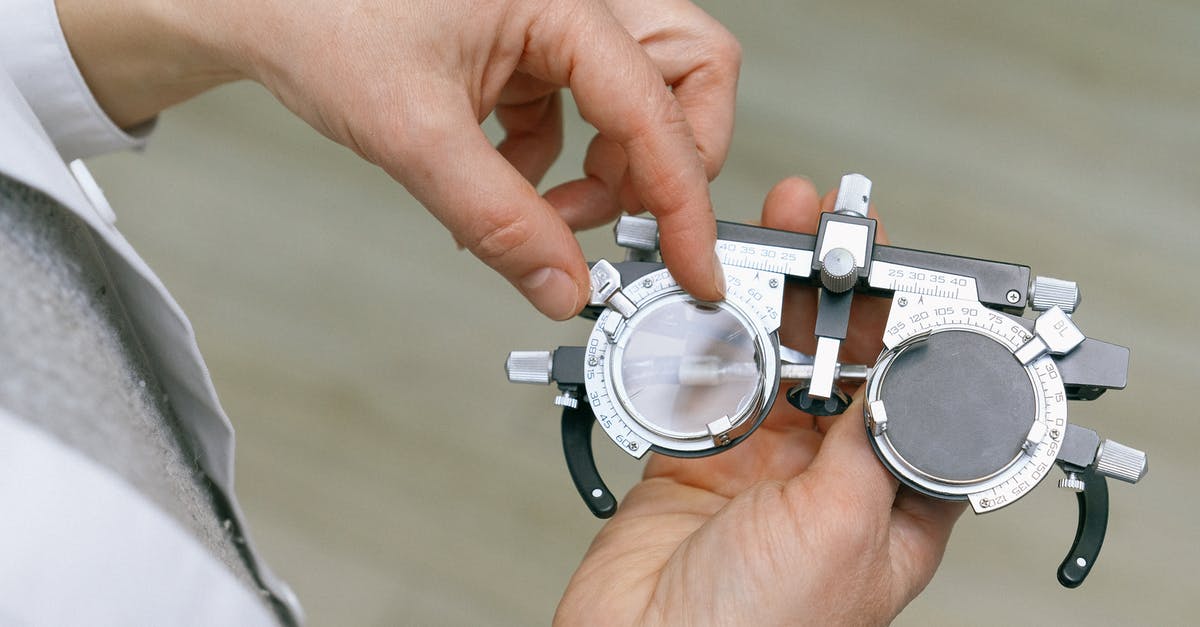 Black spotting/dust in stainless steel utensils.Is this mildew? - Crop unrecognizable medic in white coat taking measuring vision glasses while adjusting scale according to numerals written on metal surface