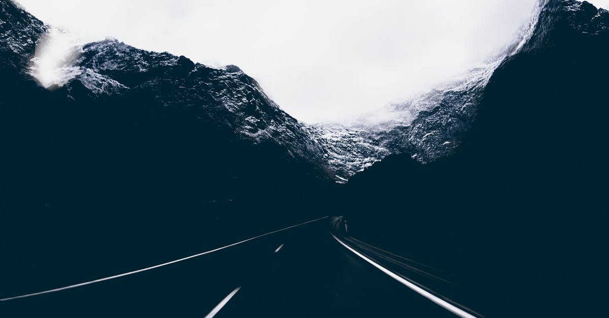 Black tea develops cloudy dregs; how to avoid? - Landscape Photo of Road in the Middle of Mountains