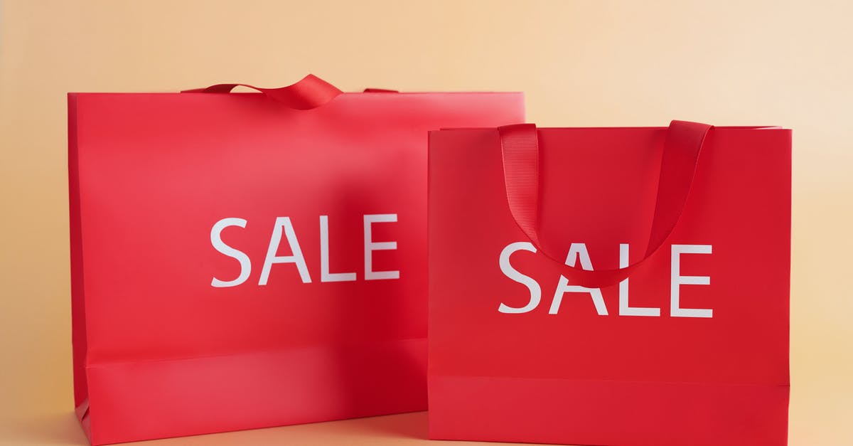 Blender Buying - Square vs. Round Container - Red Gift Bags With Sale Sign