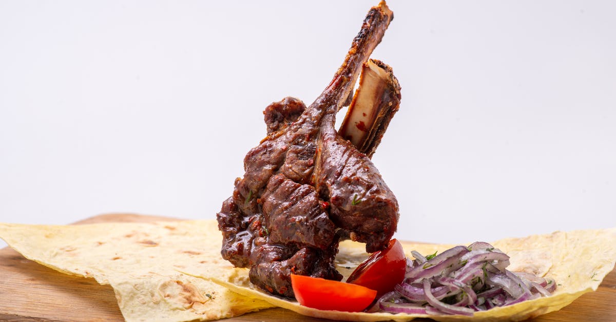 Boiled beef bones and ended up with green marrow...is this normal? - A Dish of Beef and Vegetables over a Pita Bread Boiled beef bones and ended up with green marrow...is this normal? - A Dish of Beef and Vegetables over a Pita Bread