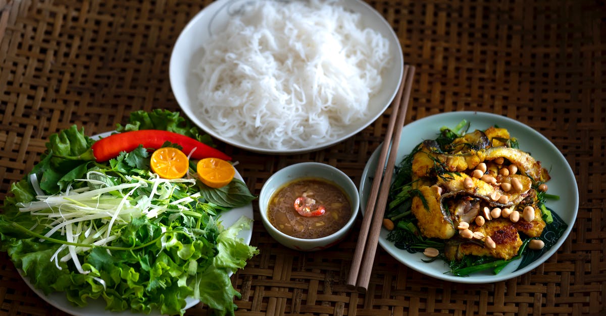 Boiling vs soaking rice noodles - Vegetables and Noodles in Plates on Table