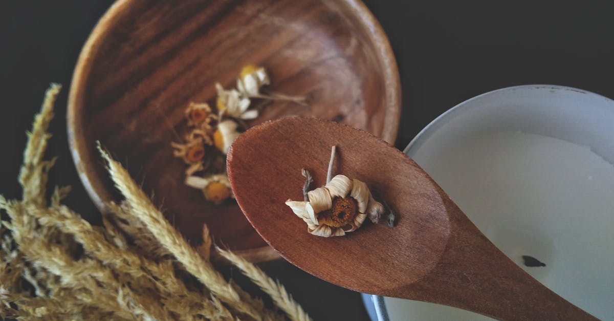 Boiling wheat vs barley - Dried Flower on a Wooden Spoon