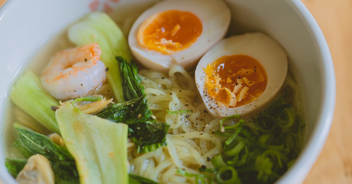 Bone broth has green tint; is this normal? - Bowl of noodle soup with boiled eggs