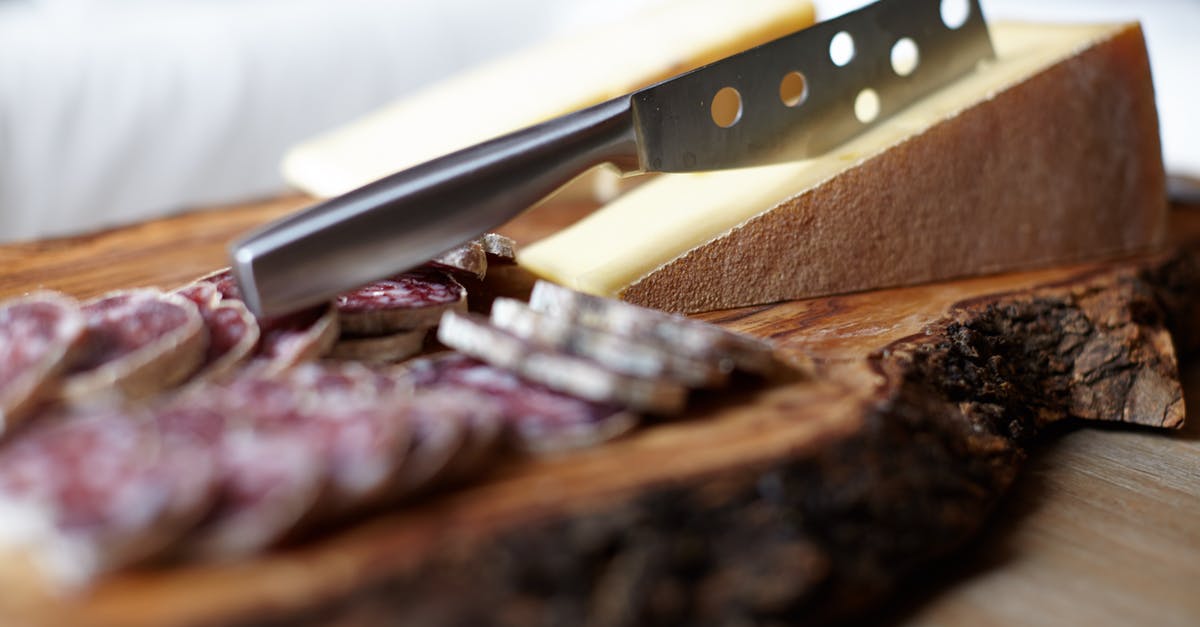 Boned pork shoulder fridge life [duplicate] - Steel Knife on Chopping Board