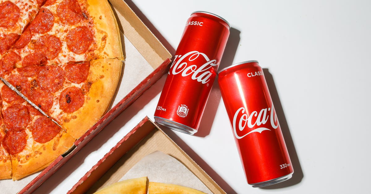 Botulism risk - homemade pizza sauce? - Coca Cola Cans Beside Pizza