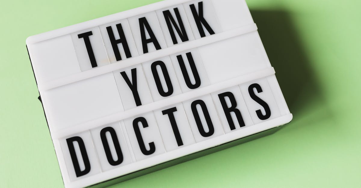 Botulism risk from anchovies in the refrigerator? - From above of vintage light box with THANK YOU DOCTORS gratitude message placed on green surface