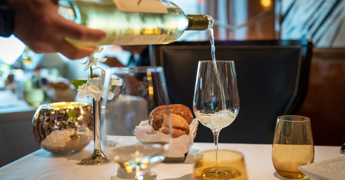 Bread has acidic smell and taste - Wine Bottle Pouring on Wine Glass