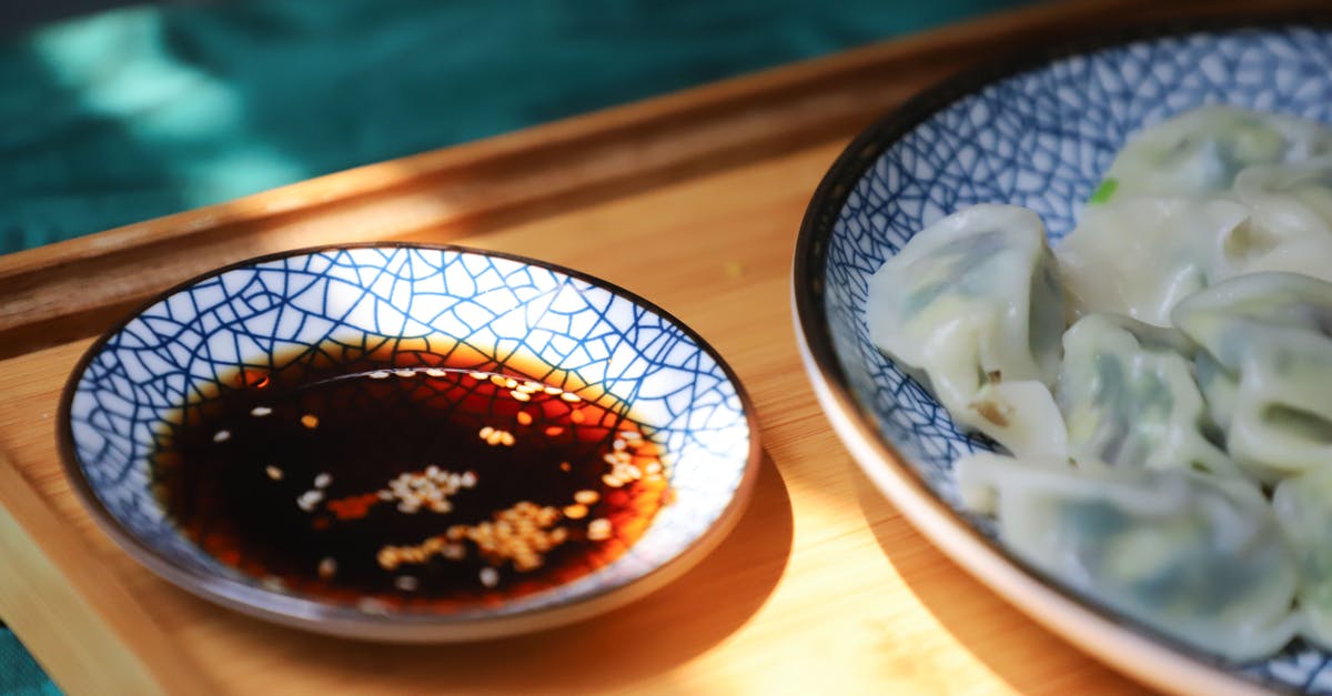 Brewed vs regular soy sauce : phytochemical content - Round Blue Saucer Filled With Soy Sauce