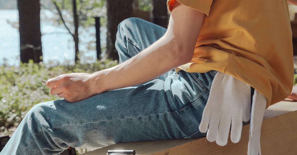 Brisket Smoking - Rest Time [duplicate] - Person in Blue Denim Jeans Sitting on Brown Wooden Bench