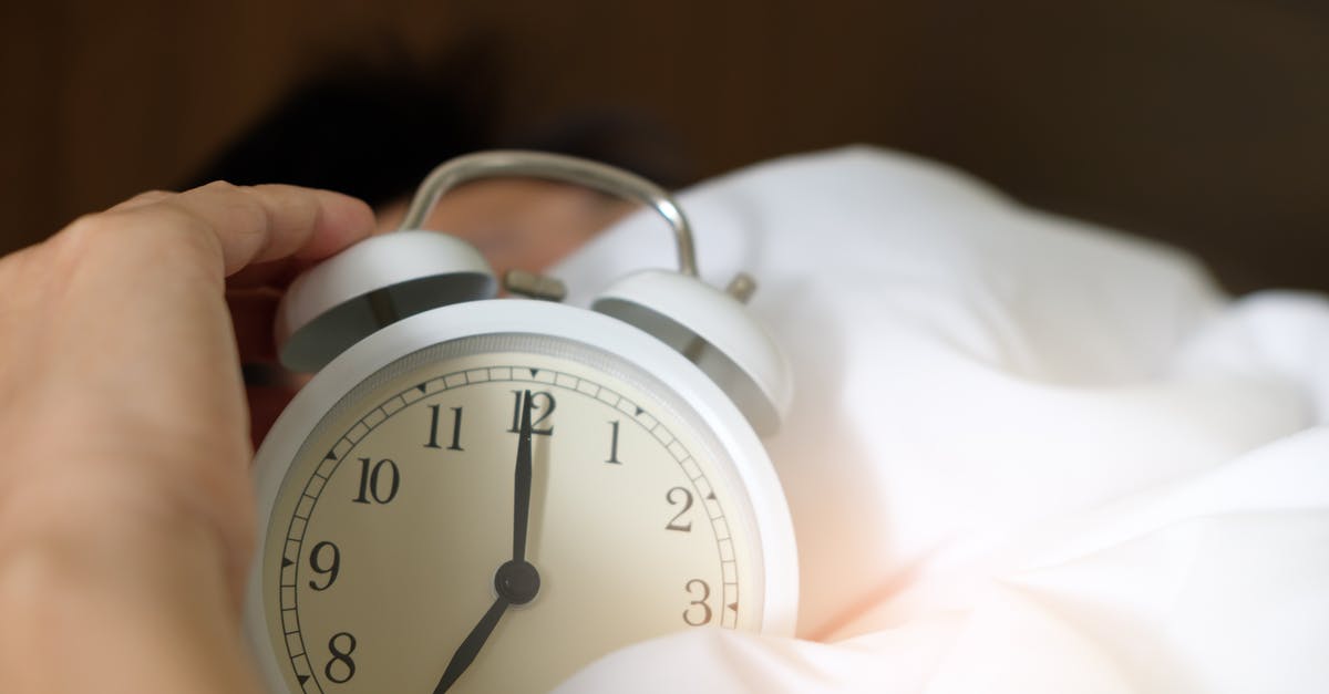 Brisket Smoking - Rest Time [duplicate] - Photo of Person Holding Alarm Clock