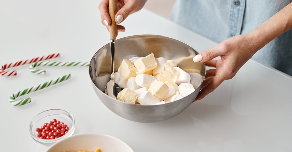 Broiler vs. second baking steel? - Person Holding Stainless Steel Bowl With Marshmallows