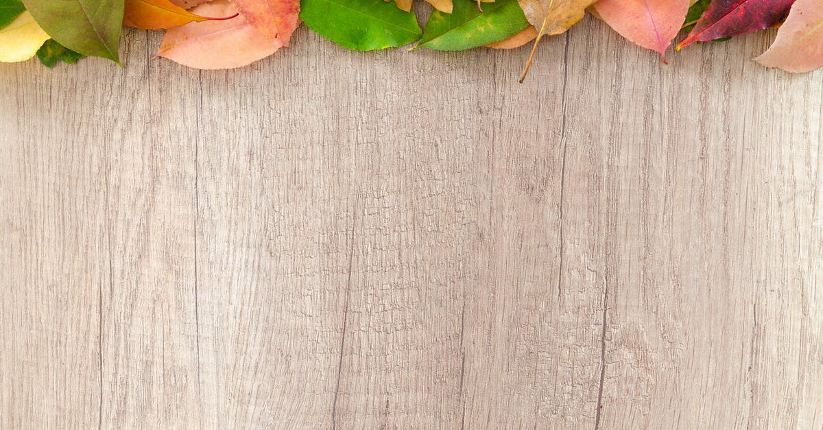 Brown Blob in natural maple syrup? - Assorted-color Leaves on Wooden Surface