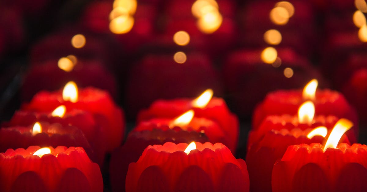 Burnt candied pecans - Red Candles With Lights during Night Time