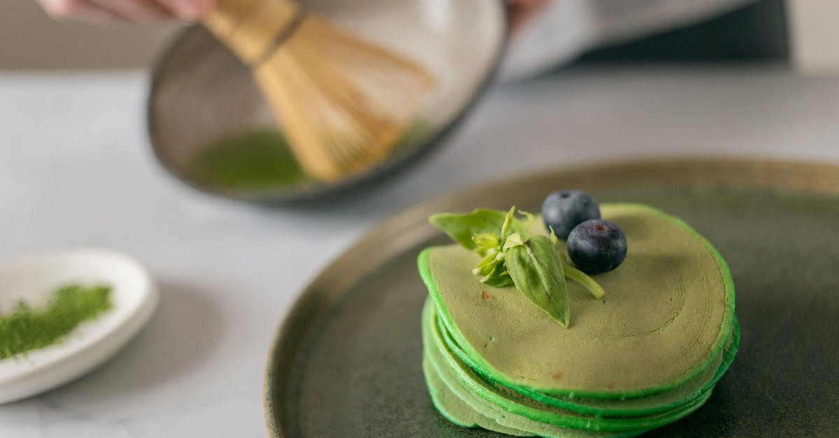 Buttermilk pancake mix is green? - Cook preparing ingredients for pancakes