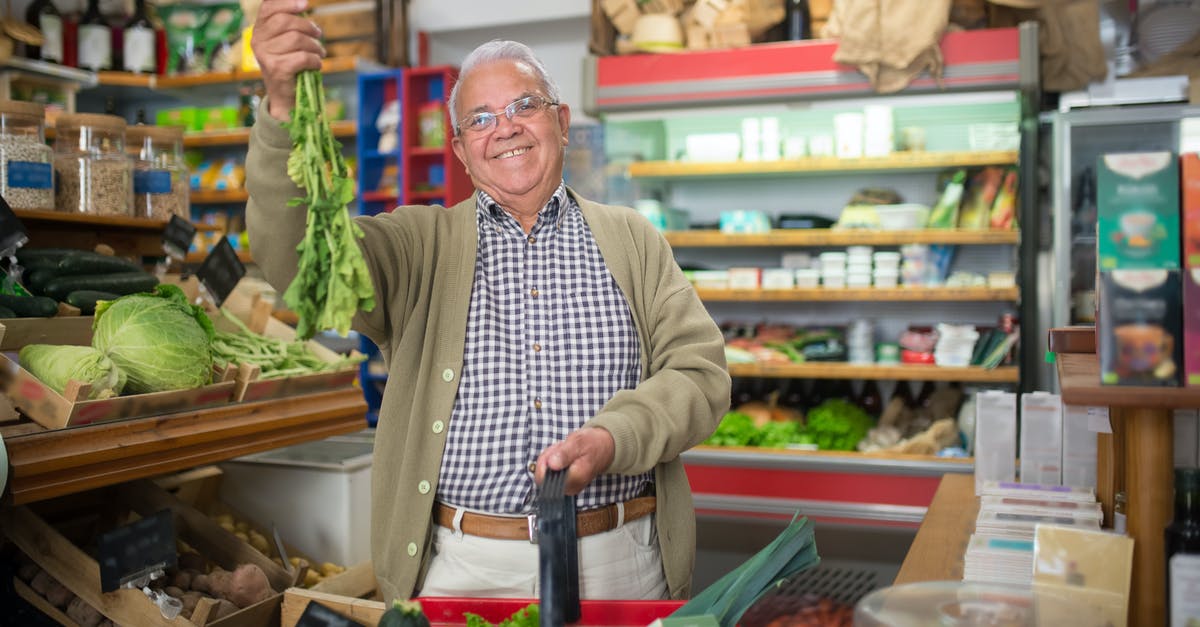 Buying whetstones - Elderly Man holding Vegetables 