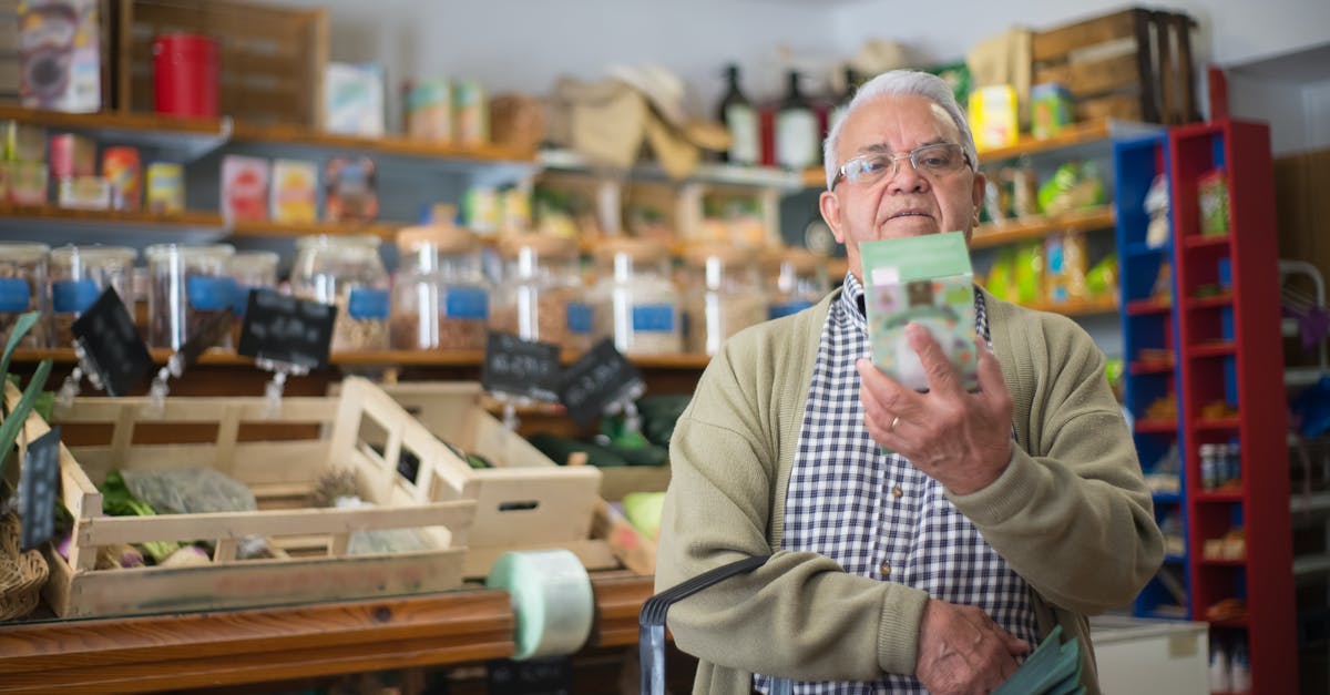 Buying whetstones - Elderly Man looking at a Product 