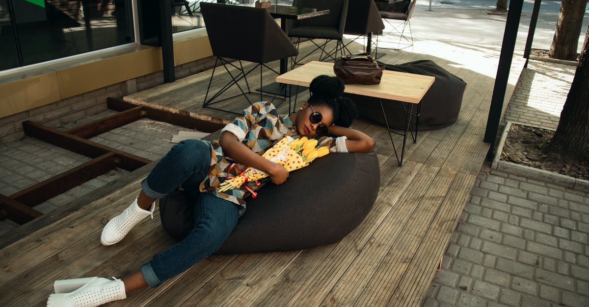 Cafe brulot in emily post's etiquette - Person Lying on Bean Bag Chair