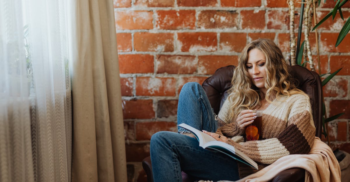 Calibrating tea dosage - Woman with Tea Reading Book