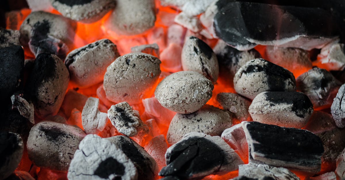 Can a charcoal grill maintain a constant high temperature? - Black and Gray Charcoals