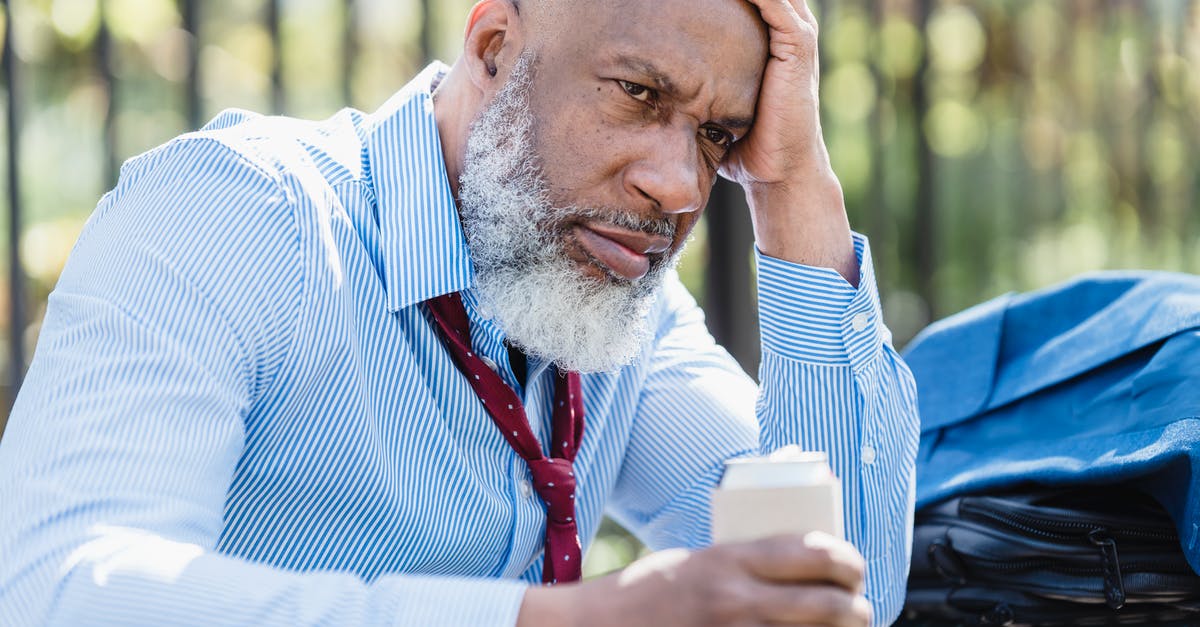 Can an American substitute for garam masala be made? - Sad black businessman with alcohol drink on street