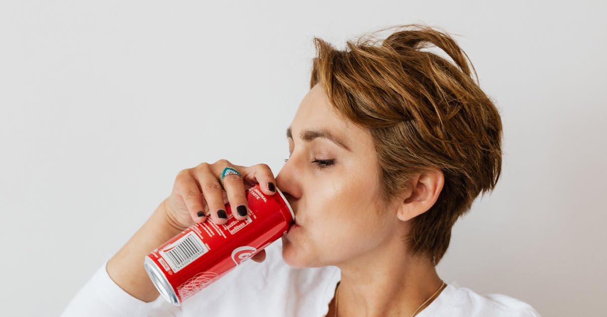 Can anyone identify this RED GINSENG CANDY? - Thirsty woman enjoying coke from colorful can