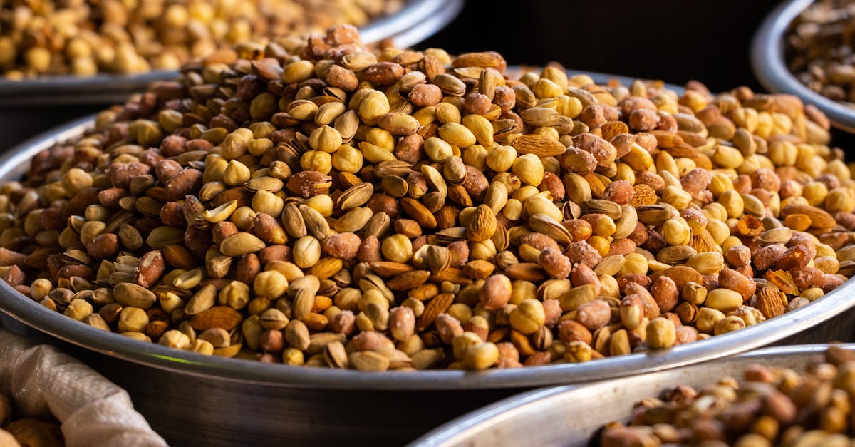 Can bitter almonds(or other nuts containing amygdalin) be made edible? - Pistachio Nuts on a Large Stainless Bowl