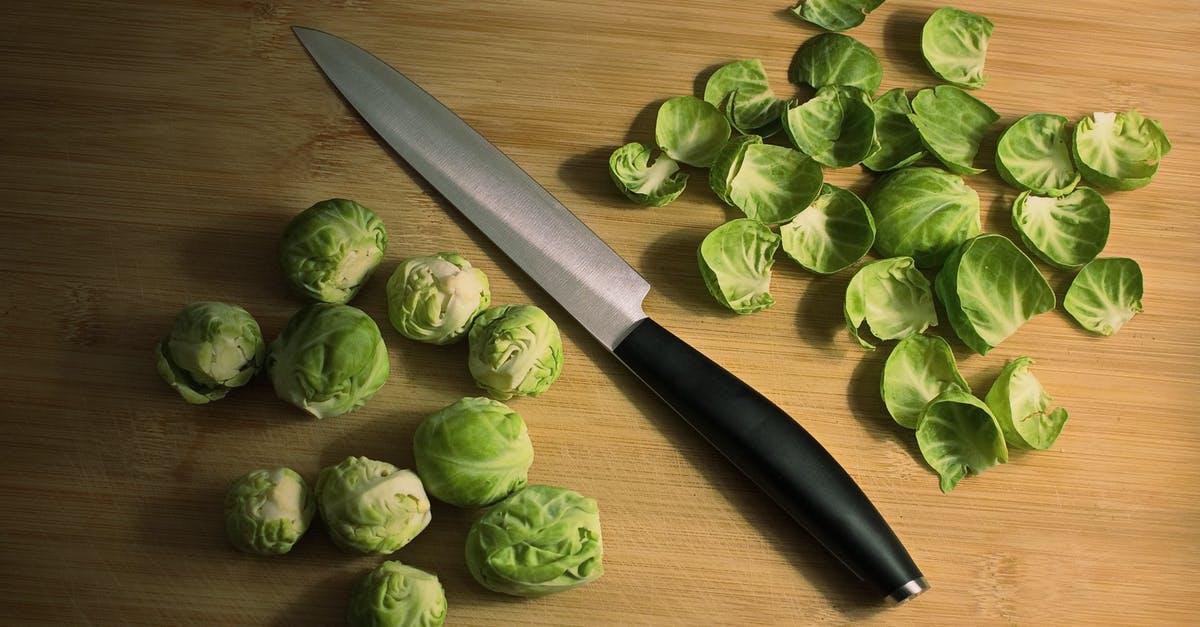 Can Brussels sprouts be eaten raw? - Knife with green Brussels sprouts