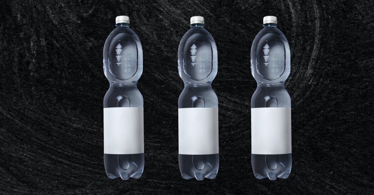 Can distilled water in gallon plastic bottles expire? - Set of plastic bottles with cold water