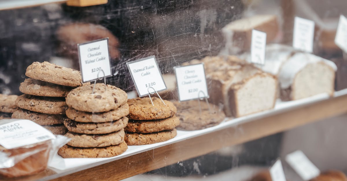 Can grocery store chocolate be used as chocolate coating? - Various tasty pastry placed on counter