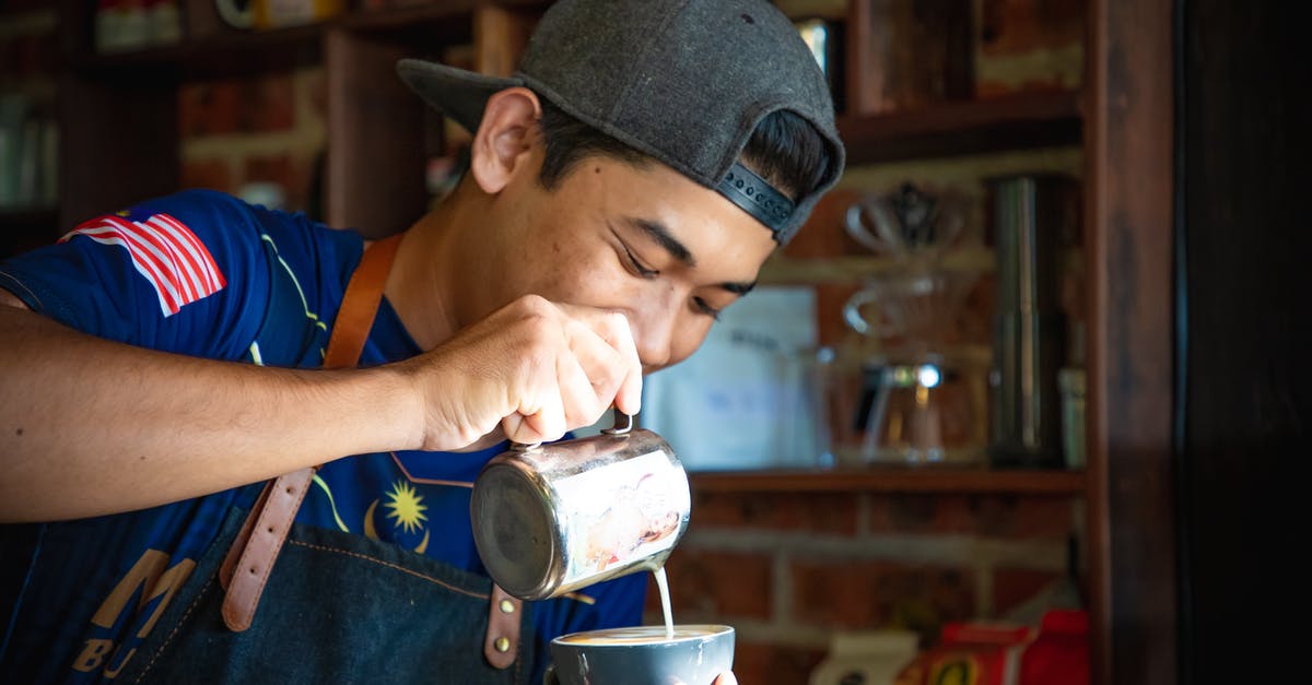 Can home-made mozzarella be made in small batches (quart of milk instead of gallon)? - Man in Blue Shirt and Gray Cap Making Cappuccino