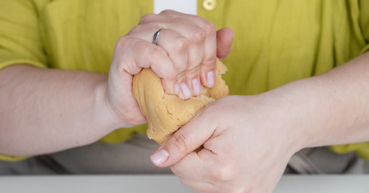 Can I bake a finished Ginger Bread House - Crop baker woman preparing dough