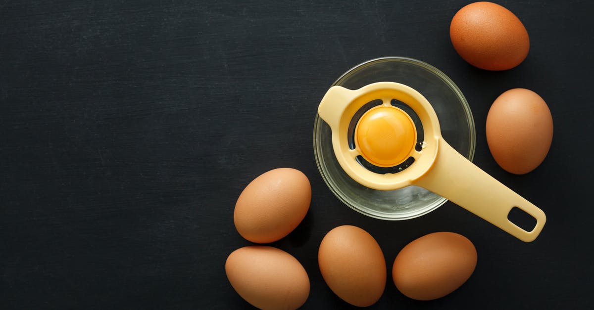 Can I defrost chicken to separate then refreeze? - Eggs and glass bowl with egg separator